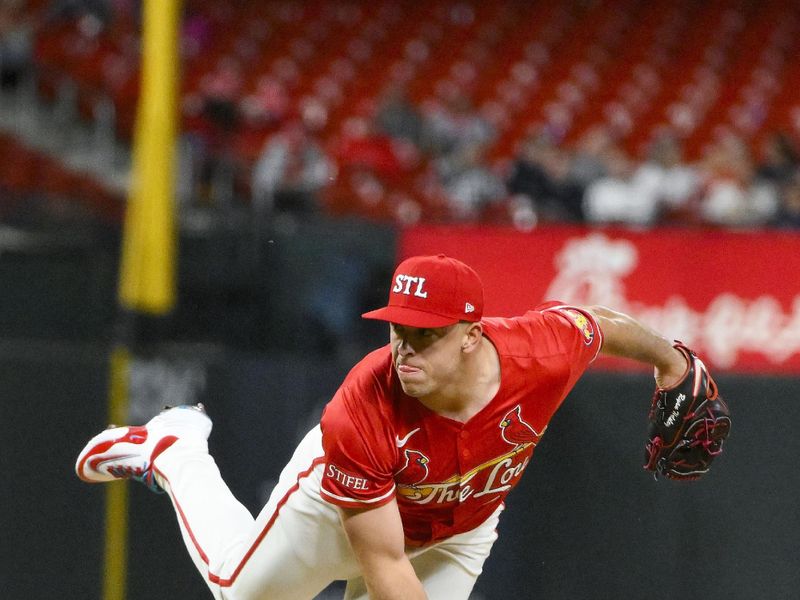 May 2, 2025; St. Louis, Missouri, USA;  St. Louis Cardinals relief pitcher Ryan Helsley (56) pitches against the New York Mets during the ninth inning at Busch Stadium. Mandatory Credit: Jeff Curry-Imagn Images