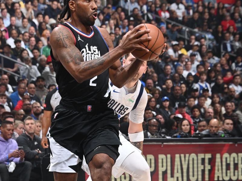 LOS ANGELES, CA - APRIL 23: Kawhi Leonard #2 of the LA Clippers handles the ball during the game against the Dallas Mavericks during Round 1 Game 2 of the 2024 NBA Playoffs on April 23, 2024 at Crypto.Com Arena in Los Angeles, California. NOTE TO USER: User expressly acknowledges and agrees that, by downloading and/or using this Photograph, user is consenting to the terms and conditions of the Getty Images License Agreement. Mandatory Copyright Notice: Copyright 2024 NBAE (Photo by Andrew D. Bernstein/NBAE via Getty Images)