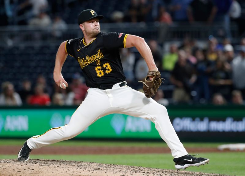 Aug 22, 2024; Pittsburgh, Pennsylvania, USA;  Pittsburgh Pirates relief pitcher Hunter Stratton (63) pitches against the Cincinnati Reds during the ninth inning at PNC Park. Mandatory Credit: Charles LeClaire-USA TODAY Sports