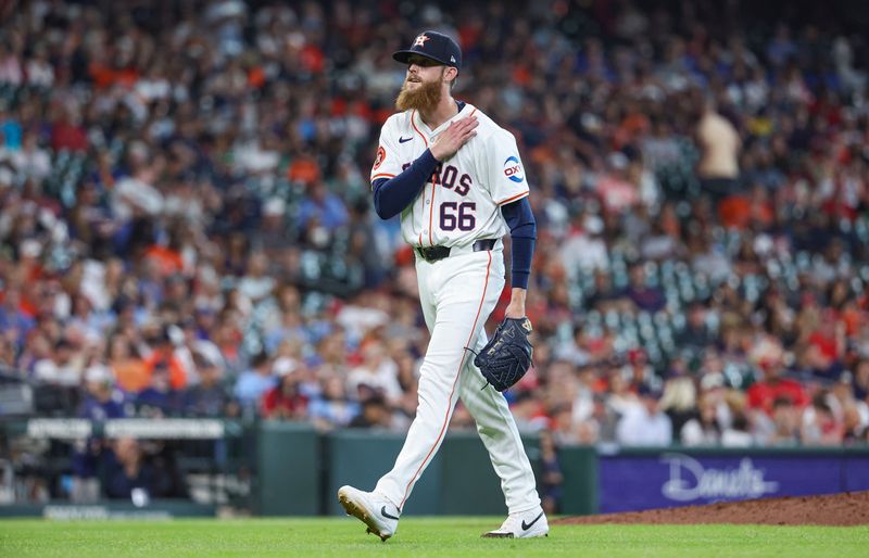 Jun 5, 2024; Houston, Texas, USA; Houston Astros relief pitcher Shawn Dubin (66) walks off the mound after pitching during the seventh inning against the St. Louis Cardinals at Minute Maid Park. Mandatory Credit: Troy Taormina-USA TODAY Sports