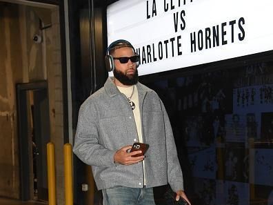 LOS ANGELES, CA - DECEMBER 26:  Cody Martin #11 of the Charlotte Hornets arrives to the arena before the game  on December 26, 2023 at Crypto.Com Arena in Los Angeles, California. NOTE TO USER: User expressly acknowledges and agrees that, by downloading and/or using this Photograph, user is consenting to the terms and conditions of the Getty Images License Agreement. Mandatory Copyright Notice: Copyright 2023 NBAE (Photo by Juan Ocampo/NBAE via Getty Images)