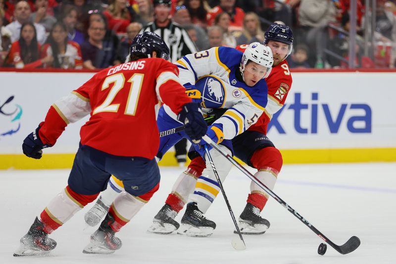 Apr 13, 2024; Sunrise, Florida, USA; Buffalo Sabres left wing Jeff Skinner (53) moves the puck past Florida Panthers center Sam Bennett (9) during the first period at Amerant Bank Arena. Mandatory Credit: Sam Navarro-USA TODAY Sports