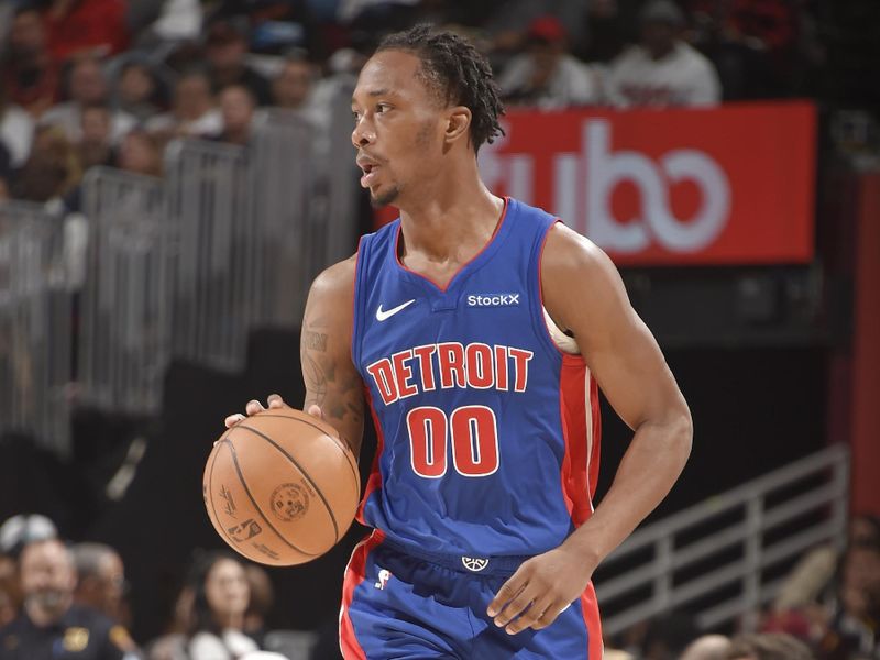 CLEVELAND, OH - OCTOBER 25: Ron Holland II #00 of the Detroit Pistons looks to pass the ball during the game against the Cleveland Cavaliers on October 25, 2024 at Rocket Mortgage FieldHouse in Cleveland, Ohio. NOTE TO USER: User expressly acknowledges and agrees that, by downloading and/or using this Photograph, user is consenting to the terms and conditions of the Getty Images License Agreement. Mandatory Copyright Notice: Copyright 2024 NBAE (Photo by David Liam Kyle/NBAE via Getty Images)