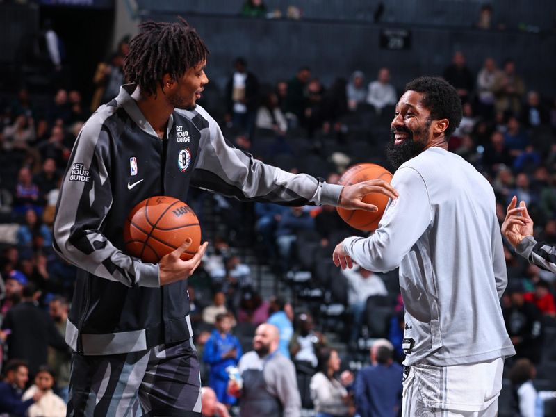 BROOKLYN, NY - MARCH 24:  Nicolas Claxton #33 of the Brooklyn Nets talks to Spencer Dinwiddie #26 of the Dallas Mavericks during the game on March 24, 2025 at Barclays Center in Brooklyn, New York. NOTE TO USER: User expressly acknowledges and agrees that, by downloading and or using this Photograph, user is consenting to the terms and conditions of the Getty Images License Agreement. Mandatory Copyright Notice: Copyright 2025 NBAE (Photo by David L. Nemec/NBAE via Getty Images)