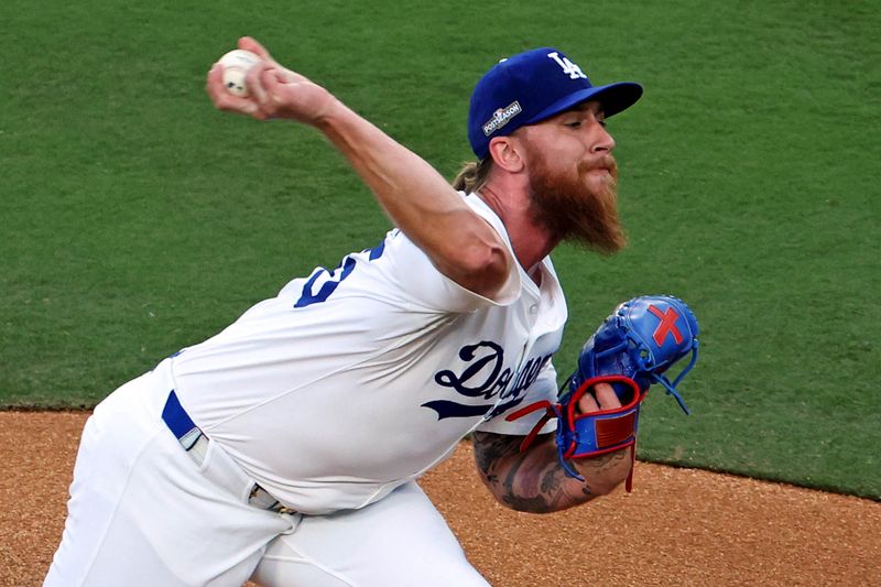 Oct 20, 2024; Los Angeles, California, USA; Los Angeles Dodgers pitcher Michael Kopech (45) pitches during the first inning against the New York Mets during game six of the NLCS for the 2024 MLB playoffs at Dodger Stadium. Mandatory Credit: Kiyoshi Mio-Imagn Images