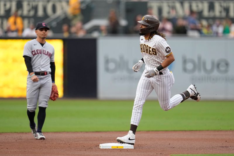 Jun 14, 2023; San Diego, California, USA;  San Diego Padres right fielder Fernando Tatis Jr. (23) hits a home run against the Cleveland Guardians during the first inning at Petco Park. Mandatory Credit: Ray Acevedo-USA TODAY Sports