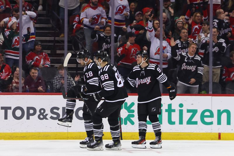 Dec 23, 2023; Newark, New Jersey, USA; New Jersey Devils right wing Timo Meier (28) celebrates his goal against the Detroit Red Wings during the first period at Prudential Center. Mandatory Credit: Ed Mulholland-USA TODAY Sports