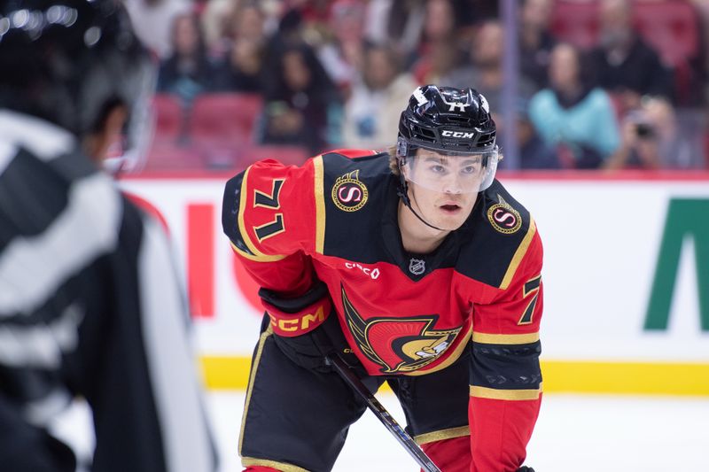 Oct 16, 2025; Ottawa, Ontario, CAN; Ottawa Senators center Ridly Greig (71) gets in position for a faceoff in the first period against the Seattle Kraken at the Canadian Tire Centre. Mandatory Credit: Marc DesRosiers-IMAGN Images