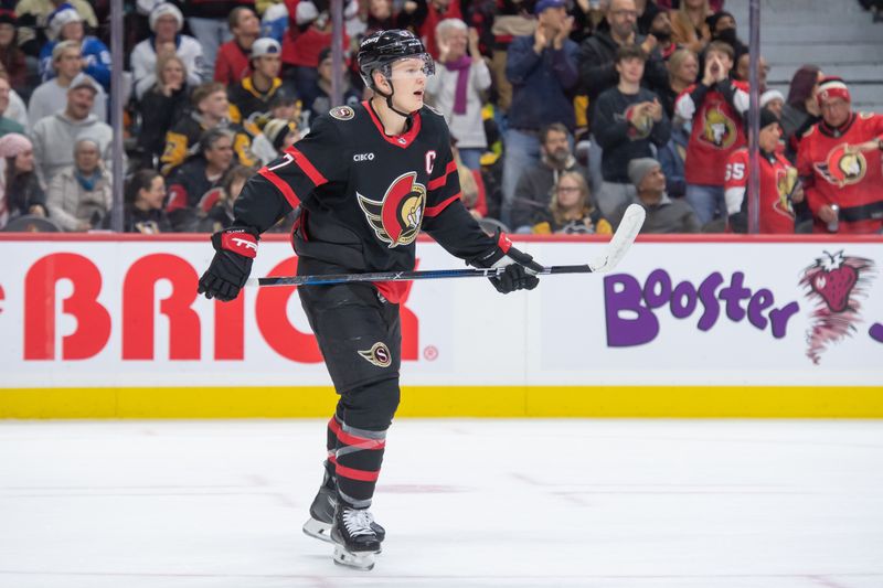 Dec 23, 2023; Ottawa, Ontario, CAN; Ottawa Senators gleft wing Brady Tkachuk (7) skates to the bench following a goal scored  in the first period against the Pittsburgh Penguins at the Canadian Tire Centre. Mandatory Credit: Marc DesRosiers-USA TODAY Sports