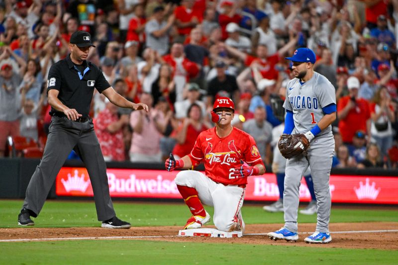 May 25, 2024; St. Louis, Missouri, USA;  St. Louis Cardinals right fielder Lars Nootbaar (21) reacts after hitting a one run triple against the Chicago Cubs during the eighth inning at Busch Stadium. Mandatory Credit: Jeff Curry-USA TODAY Sports