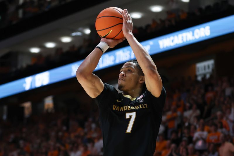 Mar 7, 2026; Knoxville, Tennessee, USA;  Vanderbilt Commodores guard Chandler Bing (7) shoots a three pointer against the Tennessee Volunteers during the second half at Thompson-Boling Arena at Food City Center. Mandatory Credit: Randy Sartin-Imagn Images