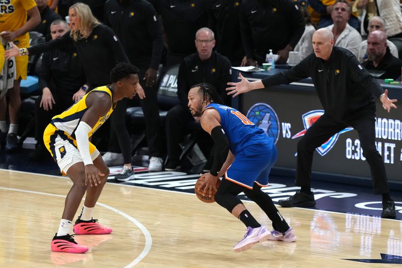 INDIANAPOLIS, INDIANA - MAY 27:  Jalen Brunson #11 of the New York Knicks is defended by Bennedict Mathurin #00 of the Indiana Pacers during the third quarter in Game Four of the Eastern Conference Finals of the 2025 NBA Playoffs at Gainbridge Fieldhouse on May 27, 2025 in Indianapolis, Indiana. NOTE TO USER: User expressly acknowledges and agrees that, by downloading and or using this photograph, User is consenting to the terms and conditions of the Getty Images License Agreement. (Photo by Dylan Buell/Getty Images)