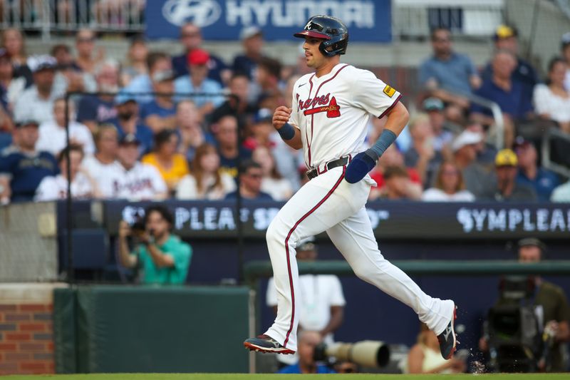 Aug 7, 2024; Atlanta, Georgia, USA; Atlanta Braves third baseman Austin Riley (27) scores a run against the Milwaukee Brewers in the first inning at Truist Park. Mandatory Credit: Brett Davis-USA TODAY Sports
