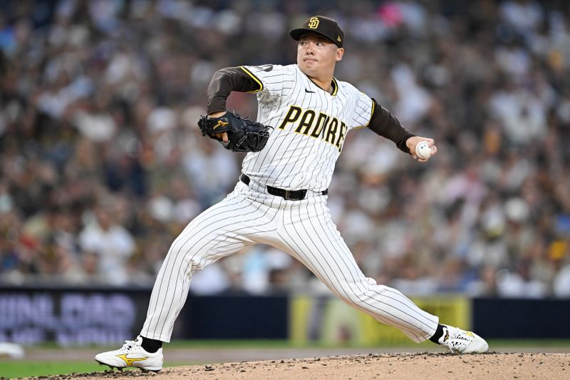 Sep 27, 2025; San Diego, California, USA; San Diego Padres relief pitcher Yuki Matsui (1) delivers during the third inning against the Arizona Diamondbacks at Petco Park. Mandatory Credit: Denis Poroy-Imagn Images