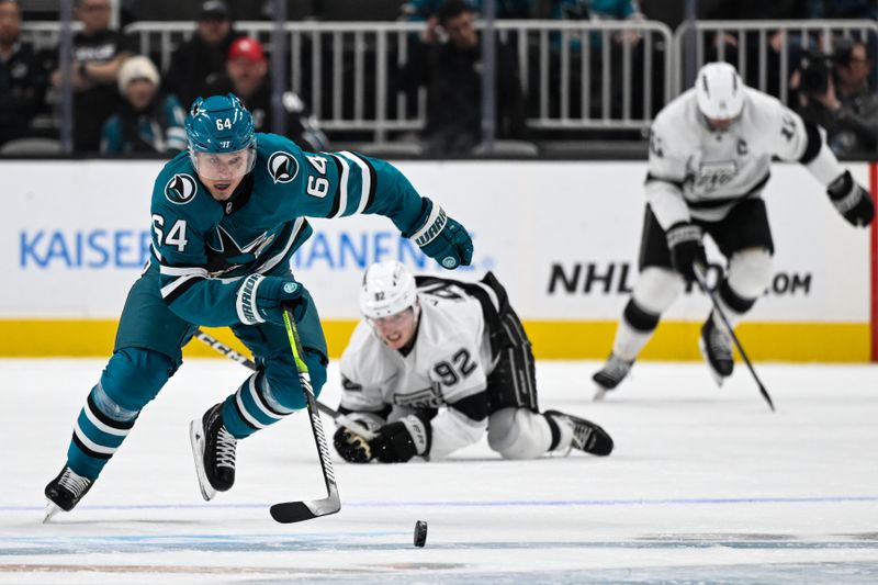 Oct 29, 2024; San Jose, California, USA; San Jose Sharks center Mikael Granlund (64) bring the puck up the ice against the Los Angeles Kings in the second period at SAP Center at San Jose. Mandatory Credit: Eakin Howard-Imagn Images