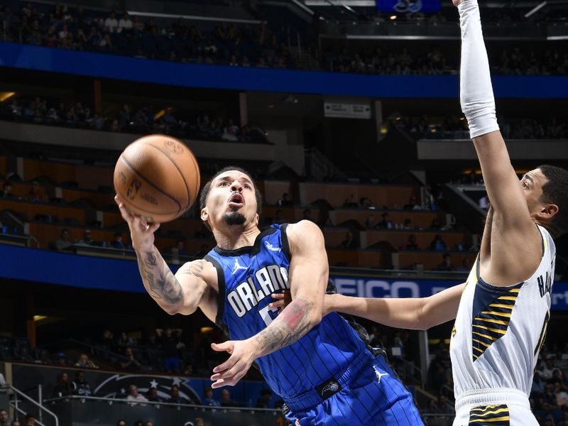 ORLANDO, FL - MARCH 10: Cole Anthony #50 of the Orlando Magic goes to the basket during the game on March 10, 2024 at Amway Center in Orlando, Florida. NOTE TO USER: User expressly acknowledges and agrees that, by downloading and or using this photograph, User is consenting to the terms and conditions of the Getty Images License Agreement. Mandatory Copyright Notice: Copyright 2024 NBAE (Photo by Fernando Medina/NBAE via Getty Images)