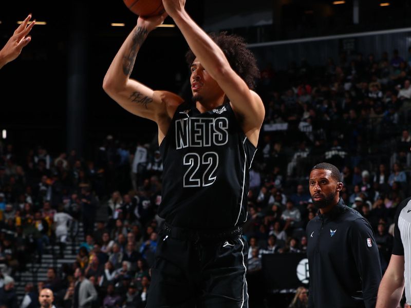 BROOKLYN, NY - NOVEMBER 19: Jalen Wilson #22 of the Brooklyn Nets shoots a three point basket during the game against the Charlotte Hornets during an Emirates NBA Cup game on November 19, 2024 at Barclays Center in Brooklyn, New York. NOTE TO USER: User expressly acknowledges and agrees that, by downloading and or using this Photograph, user is consenting to the terms and conditions of the Getty Images License Agreement. Mandatory Copyright Notice: Copyright 2024 NBAE (Photo by David L. Nemec/NBAE via Getty Images)