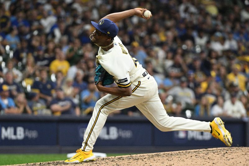 Oct 3, 2023; Milwaukee, Wisconsin, USA; Milwaukee Brewers relief pitcher Abner Uribe (45) pitches in the fifth inning against the Arizona Diamondbacks during game one of the Wildcard series for the 2023 MLB playoffs at American Family Field. Mandatory Credit: Michael McLoone-USA TODAY Sports