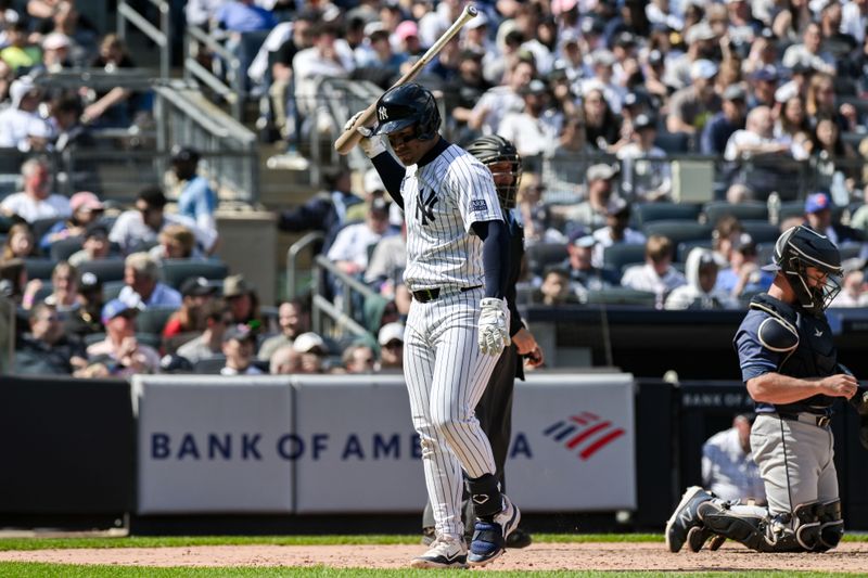 Apr 20, 2024; Bronx, New York, USA; New York Yankees second base Jahmai Jones (14) reacts after striking out against the Tampa Bay Rays during the eighth inning at Yankee Stadium. Mandatory Credit: John Jones-USA TODAY Sports