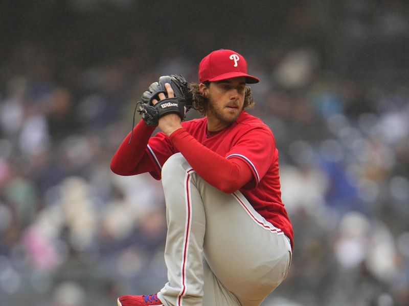 Apr 5, 2023; Bronx, New York, USA; Philadelphia Phillies pitcher Aaron Nola (27) delivers a pitch against the New York Yankees during the first inning at Yankee Stadium. Mandatory Credit: Gregory Fisher-USA TODAY Sports