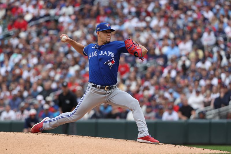 Oct 4, 2023; Minneapolis, Minnesota, USA; Toronto Blue Jays starting pitcher Jose Berrios (17) delivers a pitch in the first inning against the Minnesota Twins during game two of the Wildcard series for the 2023 MLB playoffs at Target Field. Mandatory Credit: Jesse Johnson-USA TODAY Sports