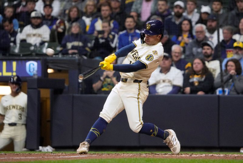 May 20, 2025; Milwaukee, Wisconsin, USA; Milwaukee Brewers outfielder Sal Frelick (10) hits a home run against the Baltimore Orioles in the fourth inning at American Family Field. Mandatory Credit: Michael McLoone-Imagn Images