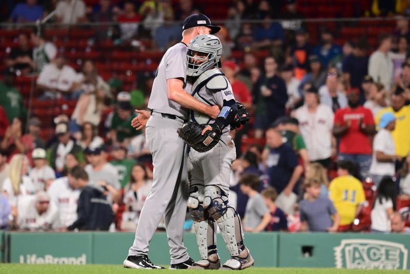 Jun 14, 2024; Boston, Massachusetts, USA; New York Yankees pitcher Michael Tonkin (50) and catcher Jose Trevino (39) celebrate beating the Boston Red Sox at Fenway Park. Mandatory Credit: Eric Canha-USA TODAY Sports