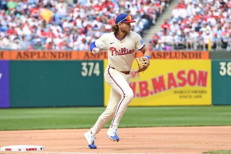Apr 20, 2025; Philadelphia, Pennsylvania, USA; Philadelphia Phillies third base Alec Bohm (28) sets himself to throw to first base against the Miami Marlins at Citizens Bank Park. Mandatory Credit: Eric Hartline-Imagn Images