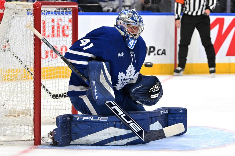 Nov 16, 2024; Toronto, Ontario, CAN;  Toronto Maple Leafs goalie Anthony Stolarz (41) makes a save against the Edmonton Oilers in the first period at Scotiabank Arena. Mandatory Credit: Dan Hamilton-Imagn Images