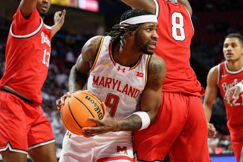 Dec 4, 2024; College Park, Maryland, USA; Maryland Terrapins guard Selton Miguel (9) grabs a rebound over Ohio State Buckeyes guard Micah Parrish (8) during the second half at Xfinity Center. Mandatory Credit: Reggie Hildred-Imagn Images