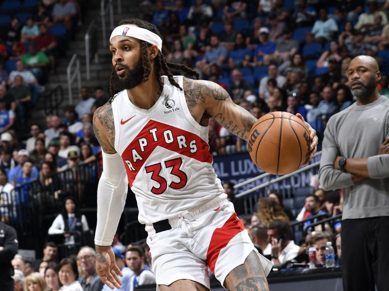 ORLANDO, FL - MARCH 17: Gary Trent Jr. #33 of the Toronto Raptors dribbles the ball during the game against the Orlando Magic on March 17, 2024 at the Kia Center in Orlando, Florida. NOTE TO USER: User expressly acknowledges and agrees that, by downloading and or using this photograph, User is consenting to the terms and conditions of the Getty Images License Agreement. Mandatory Copyright Notice: Copyright 2024 NBAE (Photo by Fernando Medina/NBAE via Getty Images)