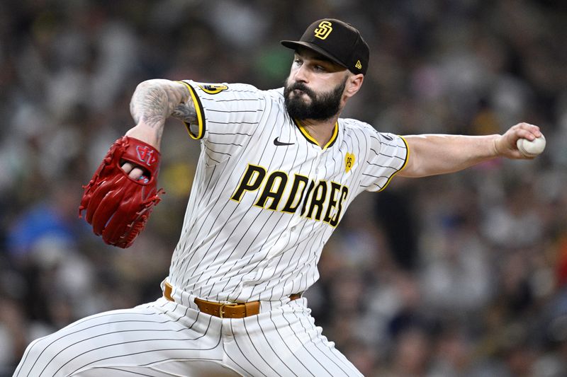 Aug 12, 2024; San Diego, California, USA; San Diego Padres relief pitcher Tanner Scott (66) pitches against the Pittsburgh Pirates during the eighth inning at Petco Park. Mandatory Credit: Orlando Ramirez-USA TODAY Sports