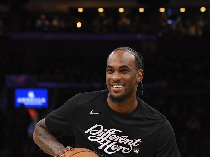 BOSTON, MA - APRIL 24: Oshae Brissett #12 of the Boston Celtics looks on before the game against the Miami Heat  during Round 1 Game 2 of the 2024 NBA Playoffs on April 24, 2024 at the TD Garden in Boston, Massachusetts. NOTE TO USER: User expressly acknowledges and agrees that, by downloading and or using this photograph, User is consenting to the terms and conditions of the Getty Images License Agreement. Mandatory Copyright Notice: Copyright 2024 NBAE  (Photo by Brian Babineau/NBAE via Getty Images)