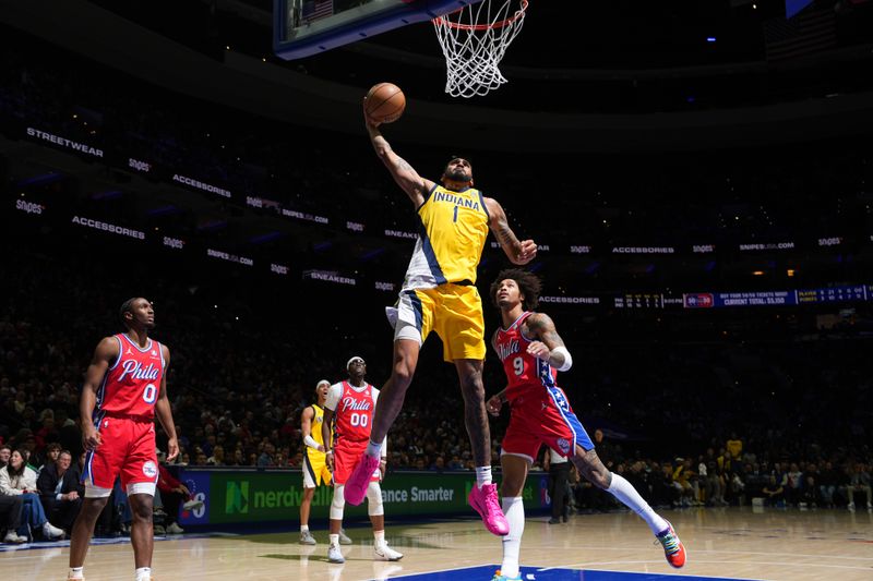 PHILADELPHIA, PA - DECEMBER 13: Obi Toppin #1 of the Indiana Pacers drives to the basket during the game against the Philadelphia 76ers  on December 13, 2024 at the Wells Fargo Center in Philadelphia, Pennsylvania NOTE TO USER: User expressly acknowledges and agrees that, by downloading and/or using this Photograph, user is consenting to the terms and conditions of the Getty Images License Agreement. Mandatory Copyright Notice: Copyright 2024 NBAE (Photo by Jesse D. Garrabrant/NBAE via Getty Images)