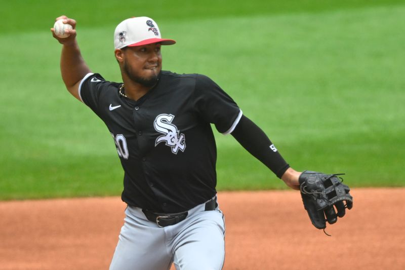 Jul 4, 2024; Cleveland, Ohio, USA; Chicago White Sox third baseman Lenyn Sosa (50) throws to first base in the first inning against the Cleveland Guardians at Progressive Field. Mandatory Credit: David Richard-USA TODAY Sports