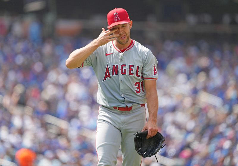 Aug 25, 2024; Toronto, Ontario, CAN; Los Angeles Angels starting pitcher Tyler Anderson (31) walks towards the dugout against the Toronto Blue Jays during the third inning at Rogers Centre. Mandatory Credit: Nick Turchiaro-USA TODAY Sports