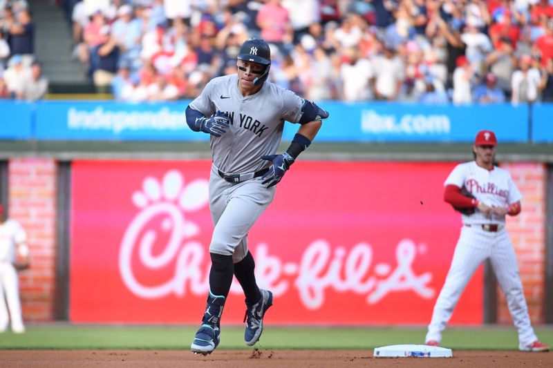 Jul 29, 2024; Philadelphia, Pennsylvania, USA; New York Yankees outfielder Aaron Judge (99) runs the bases after hitting a home run against the Philadelphia Phillies during the first inning at Citizens Bank Park. Mandatory Credit: Eric Hartline-USA TODAY Sports