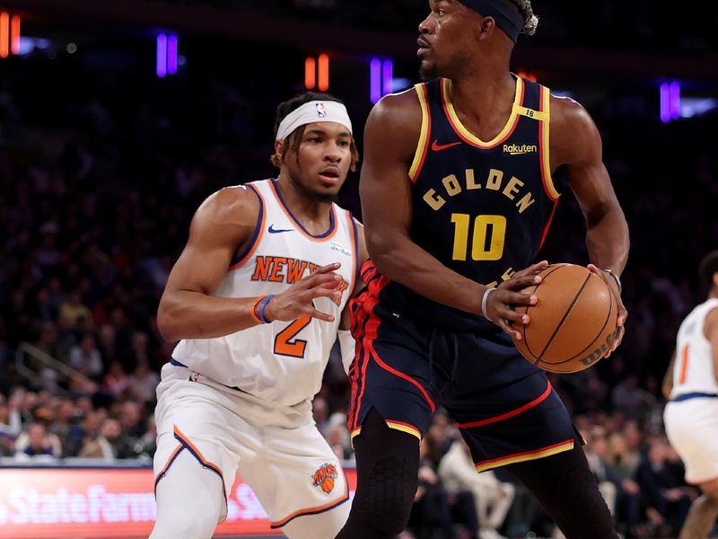 NEW YORK, NEW YORK - MARCH 04: Jimmy Butler III #10 of the Golden State Warriors looks to get past Miles McBride #2 of the New York Knicks in the first half at Madison Square Garden on March 04, 2025 in New York City. NOTE TO USER: User expressly acknowledges and agrees that, by downloading and or using this photograph, User is consenting to the terms and conditions of the Getty Images License Agreement. (Photo by Elsa/Getty Images)