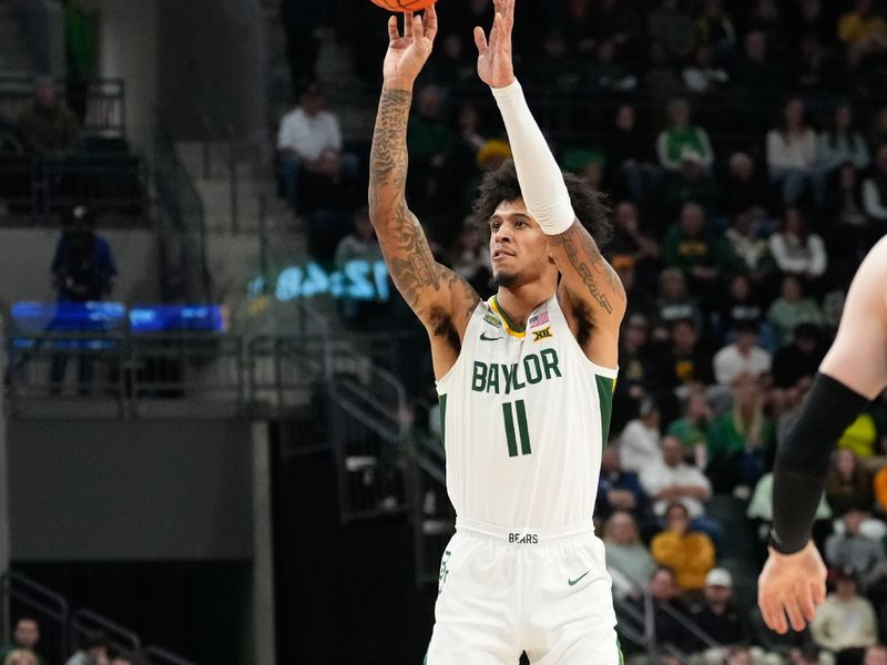 Jan 9, 2024; Waco, Texas, USA; Baylor Bears forward Jalen Bridges (11) scores a three point basket against the Brigham Young Cougars during the first half at Paul and Alejandra Foster Pavilion. Mandatory Credit: Chris Jones-USA TODAY Sports