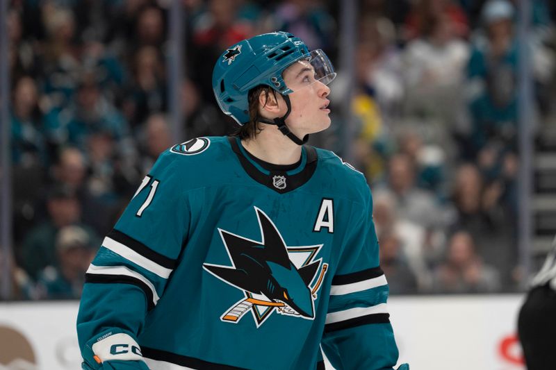 Jan 23, 2026; San Jose, California, USA;  San Jose Sharks center MacKlin Celebrini (71) looks up at the screen during the first period against the New York Rangers at SAP Center at San Jose. Mandatory Credit: Stan Szeto-Imagn Images