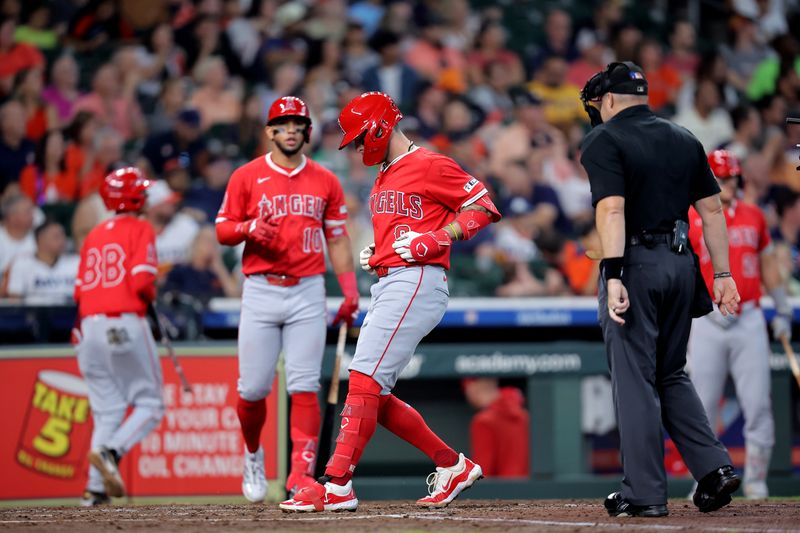 Sep 1, 2025; Houston, Texas, USA; Los Angeles Angels shortstop Zach Neto (9) crosses home plate after hitting a home run to left field against the Houston Astros during the fourth inning at Daikin Park. Mandatory Credit: Erik Williams-Imagn Images