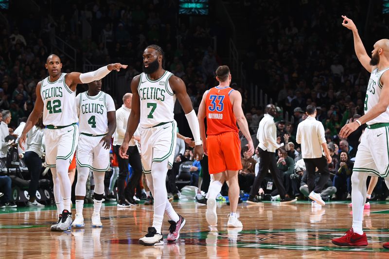 BOSTON, MA - APRIL 3: Al Horford #42 and Derrick White #9 of the Boston Celtics celebrate three point basket during the game against the Oklahoma City Thunder on April 3, 2024 at the TD Garden in Boston, Massachusetts. NOTE TO USER: User expressly acknowledges and agrees that, by downloading and or using this photograph, User is consenting to the terms and conditions of the Getty Images License Agreement. Mandatory Copyright Notice: Copyright 2024 NBAE  (Photo by Brian Babineau/NBAE via Getty Images)