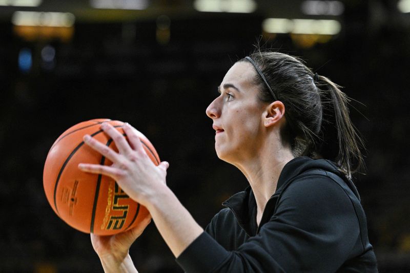 Feb 8, 2024; Iowa City, Iowa, USA; Iowa Hawkeyes guard Caitlin Clark (22) warms up before the game against the Penn State Nittany Lions at Carver-Hawkeye Arena. Mandatory Credit: Jeffrey Becker-USA TODAY Sports