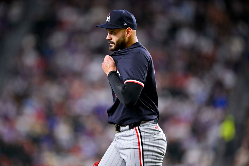 Aug 18, 2024; Arlington, Texas, USA; Minnesota Twins starting pitcher Pablo Lopez (49) comes off the field after he pitches against the Texas Rangers during the fourth inning at Globe Life Field. Mandatory Credit: Jerome Miron-USA TODAY Sports