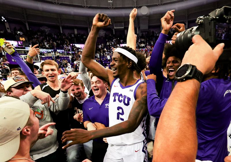 Jan 13, 2024; Fort Worth, Texas, USA; TCU Horned Frogs forward Emanuel Miller (2) celebrates with fans after the game against the Houston Cougars at Ed and Rae Schollmaier Arena. Mandatory Credit: Kevin Jairaj-USA TODAY Sports