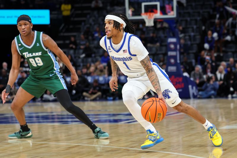 Feb 1, 2026; Memphis, Tennessee, USA; Memphis Tigers guard Dug McDaniel (1) drives to the basket against the Tulane Green Wave during the first half at FedExForum. Mandatory Credit: Wesley Hale-Imagn Images