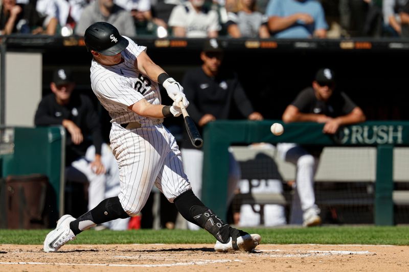 Sep 26, 2024; Chicago, Illinois, USA; Chicago White Sox first baseman Andrew Vaughn (25) hits a two-run single against the Los Angeles Angels during the fifth inning at Guaranteed Rate Field. Mandatory Credit: Kamil Krzaczynski-Imagn Images