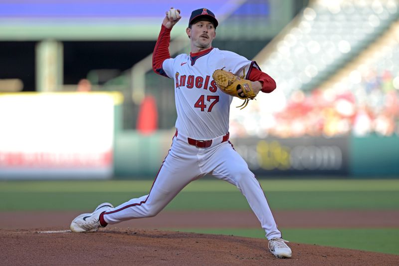 Jul 30, 2024; Anaheim, California, USA;  Los Angeles Angels starting pitcher Griffin Canning (47) delivers to the plate in the second inning against the Colorado Rockies at Angel Stadium. Mandatory Credit: Jayne Kamin-Oncea-USA TODAY Sports