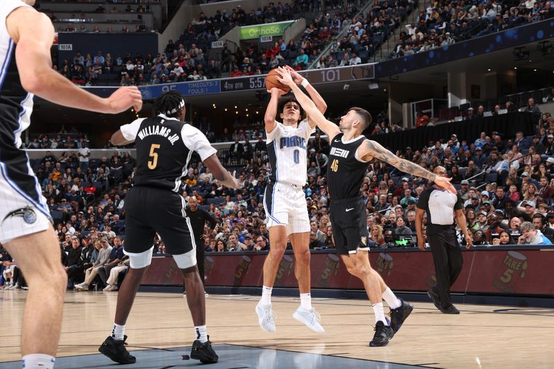 MEMPHIS, TN - JANUARY 26:  Anthony Black #0 of the Orlando Magic shoots the ball during the game against the Memphis Grizzlies on January 26, 2024 at FedExForum in Memphis, Tennessee. NOTE TO USER: User expressly acknowledges and agrees that, by downloading and or using this photograph, User is consenting to the terms and conditions of the Getty Images License Agreement. Mandatory Copyright Notice: Copyright 2024 NBAE (Photo by Joe Murphy/NBAE via Getty Images)