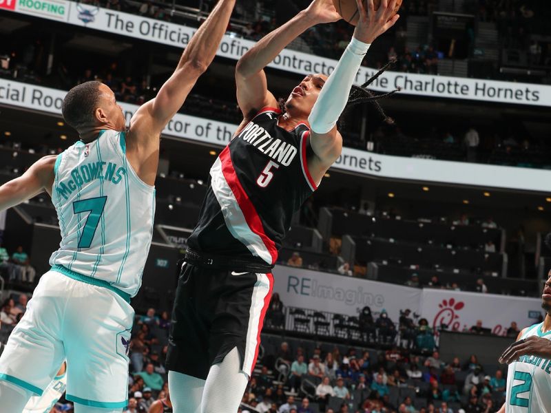 CHARLOTTE, NC - APRIL 3: Dalano Banton #5 of the Portland Trail Blazers goes to the basket during the game on April 3, 2024 at Spectrum Center in Charlotte, North Carolina. NOTE TO USER: User expressly acknowledges and agrees that, by downloading and or using this photograph, User is consenting to the terms and conditions of the Getty Images License Agreement. Mandatory Copyright Notice: Copyright 2024 NBAE (Photo by Kent Smith/NBAE via Getty Images)